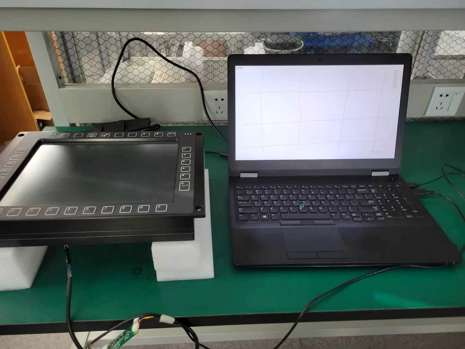 Touch response test on an HMI display